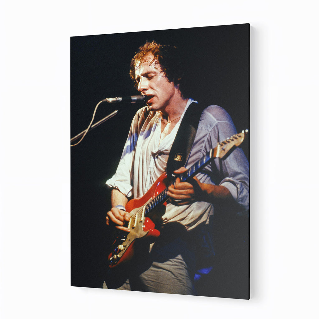 Mark Knopfler 1978 color metal print displayed on a wall