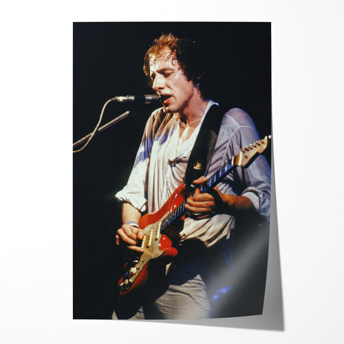 Unframed color print of Mark Knopfler singing with his red guitar at Neue Welt, West Berlin, 1978