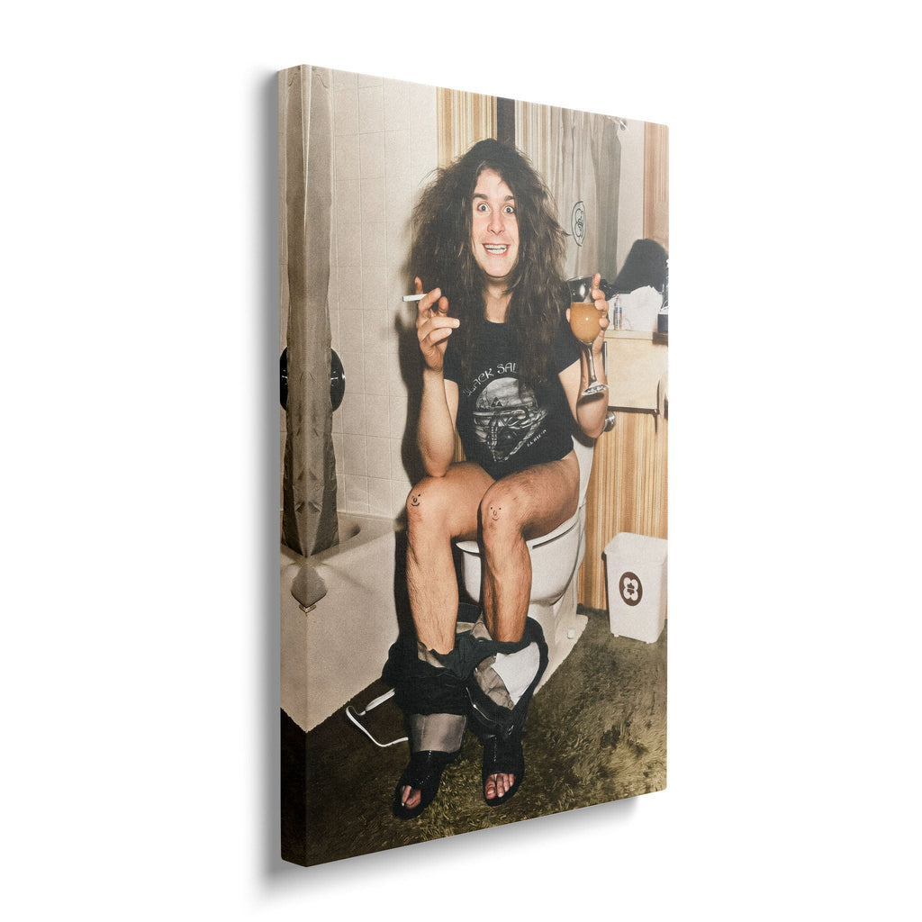 Gallery-wrapped colour canvas of Ozzy Osbourne on the toilet displayed on a wall