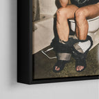 Corner close-up of the black floating frame on the Ozzy Osbourne bathroom colour canvas