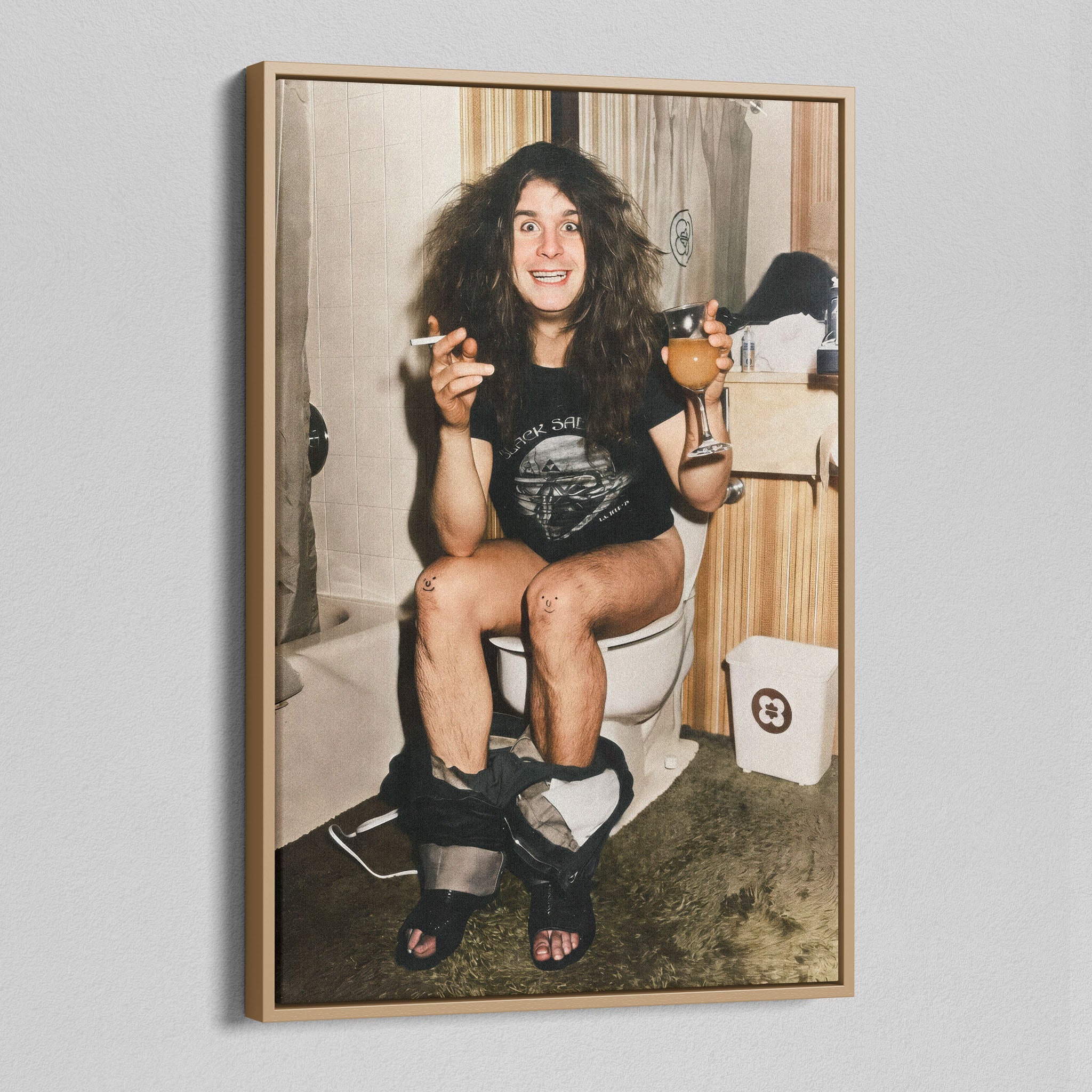 Angled view of the Ozzy Osbourne bathroom colour canvas in a natural oak floating frame
