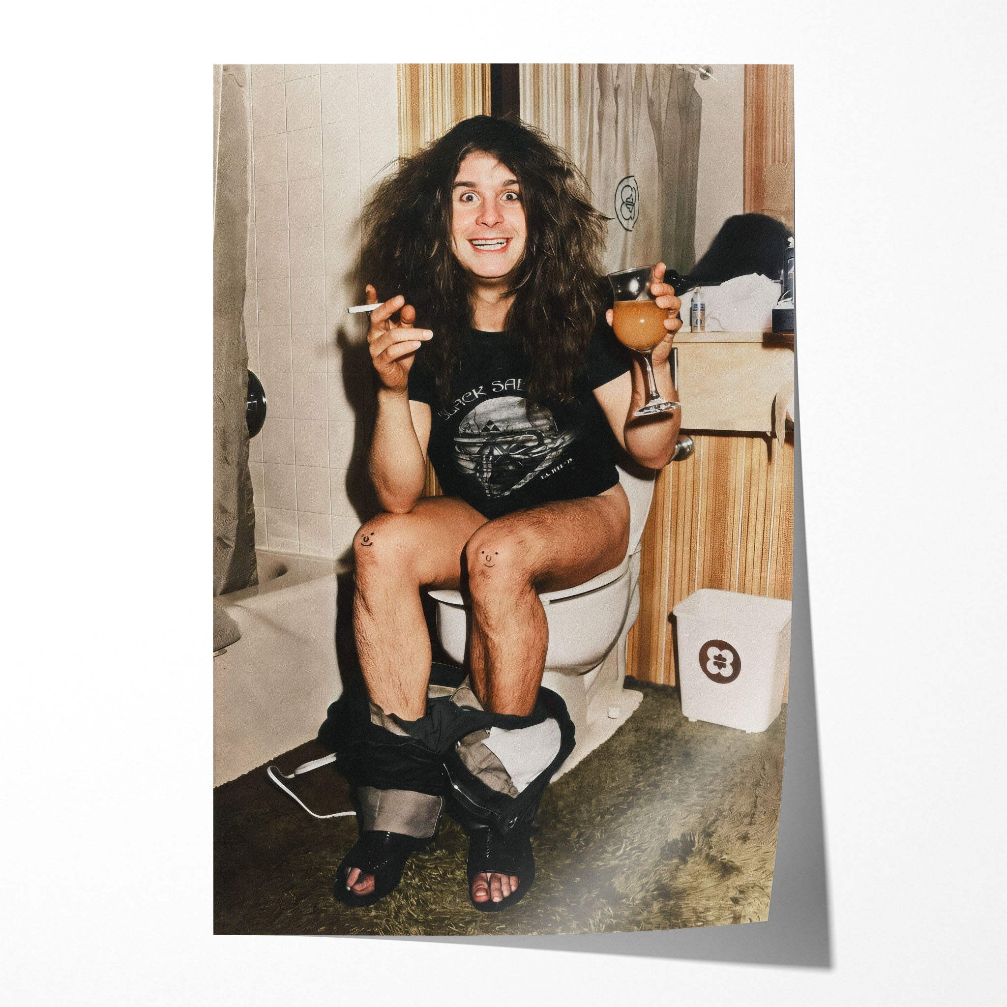 Unframed colour print of Ozzy Osbourne sitting on the toilet in his 1978 Black Sabbath tour shirt
