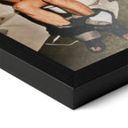 Close-up of the Ozzy Osbourne bathroom colour poster in a classic black wood frame
