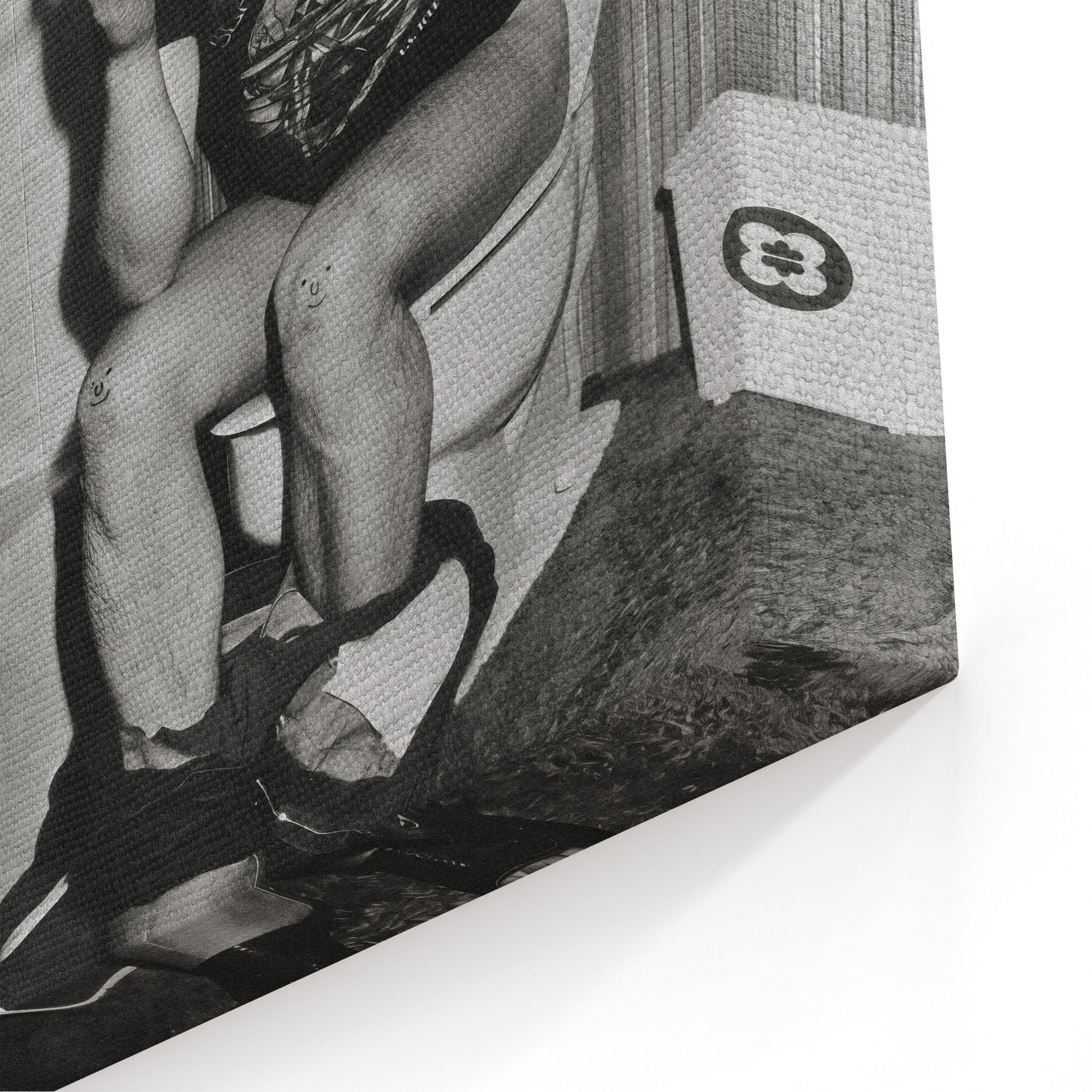 Close-up of the gallery-wrapped canvas edge on the Ozzy Osbourne bathroom black and white print