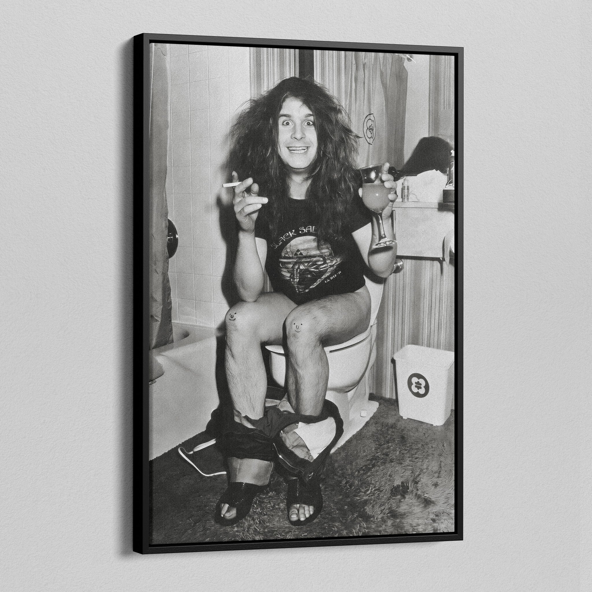 Angled view of the Ozzy Osbourne bathroom black and white canvas in a black floating frame