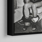 Corner close-up of the black floating frame on the Ozzy Osbourne bathroom black and white canvas
