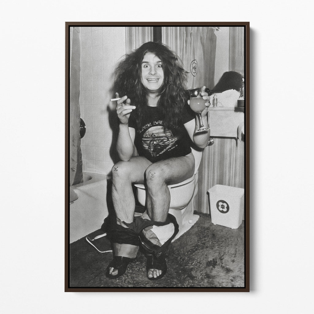 Front display of the Ozzy Osbourne bathroom black and white canvas in a dark walnut floating frame