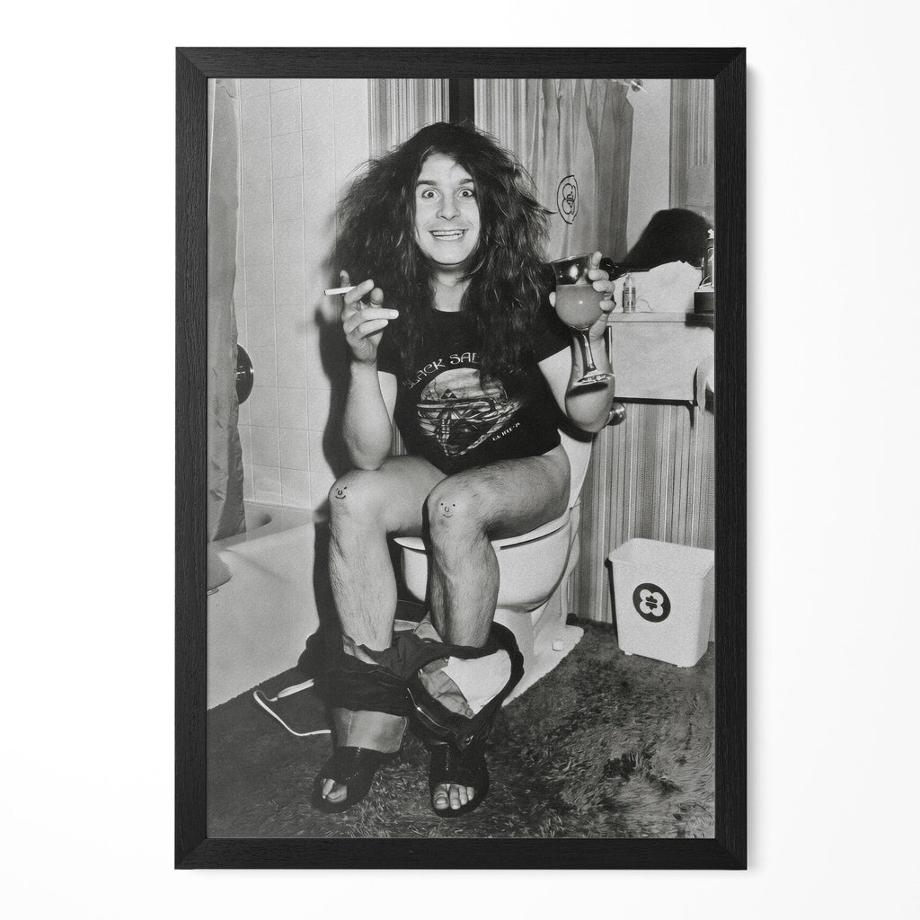 Funny black and white photo of Ozzy Osbourne on the toilet in 1978, in a classic black poster frame
