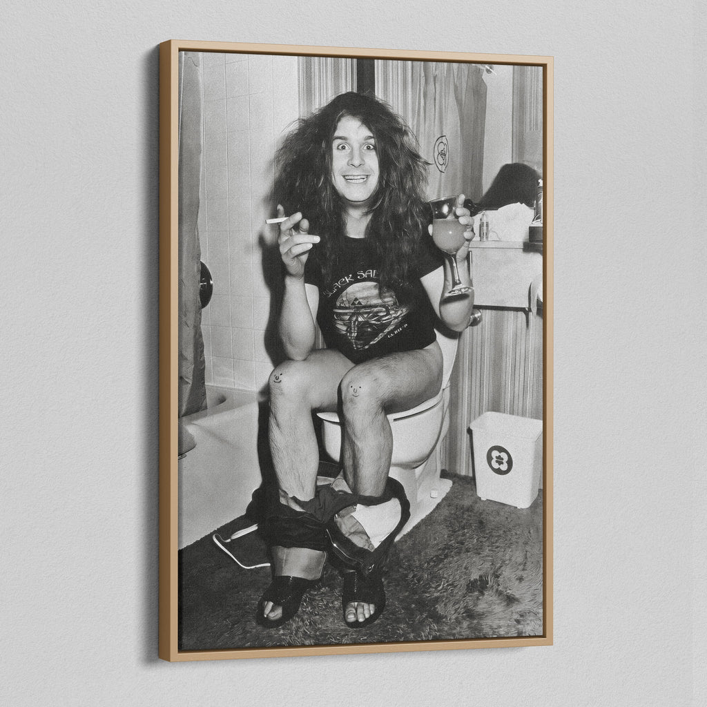 Angled view of the Ozzy Osbourne bathroom black and white canvas in a natural oak floating frame