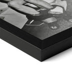 Close-up of the Ozzy Osbourne bathroom black and white poster in a classic black wood frame