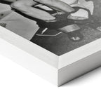 Corner close-up of the Ozzy Osbourne bathroom black and white poster in a white frame
