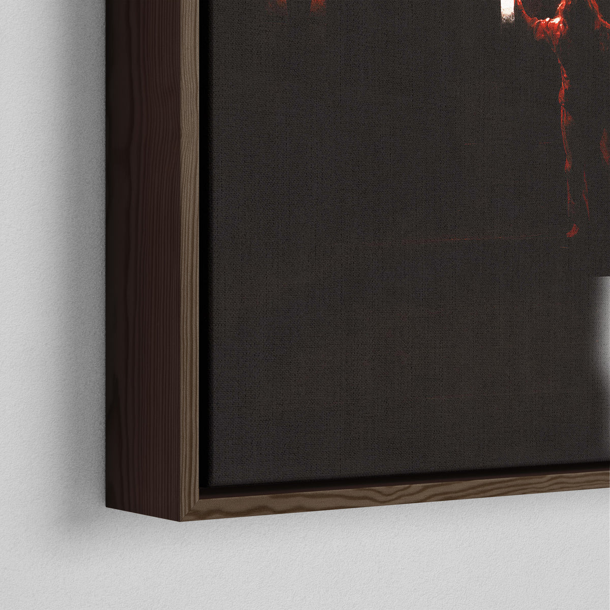 Close-up of the dark walnut floating frame on the Ozzy Osbourne color canvas