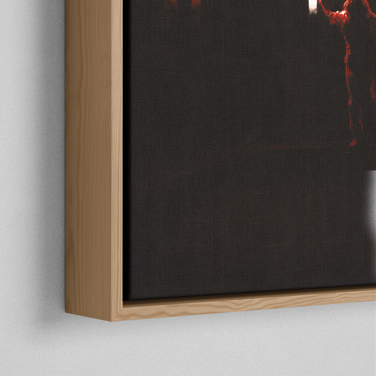 Corner close-up of the natural oak floating frame on the Ozzy Osbourne color canvas