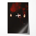 Unframed color print of Ozzy Osbourne raising a white cross between flaming torches and red smoke