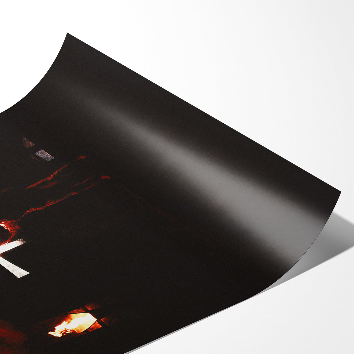 Angled close-up of the unframed Ozzy Osbourne raised cross color poster showing fine paper detail