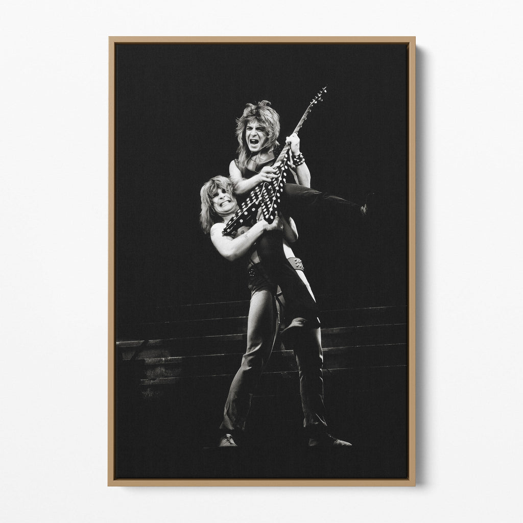 Front display of the Ozzy and Randy Rhoads black and white canvas in a natural oak floating frame
