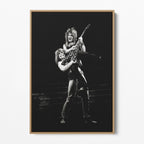 Front display of the Ozzy and Randy Rhoads black and white canvas in a natural oak floating frame
