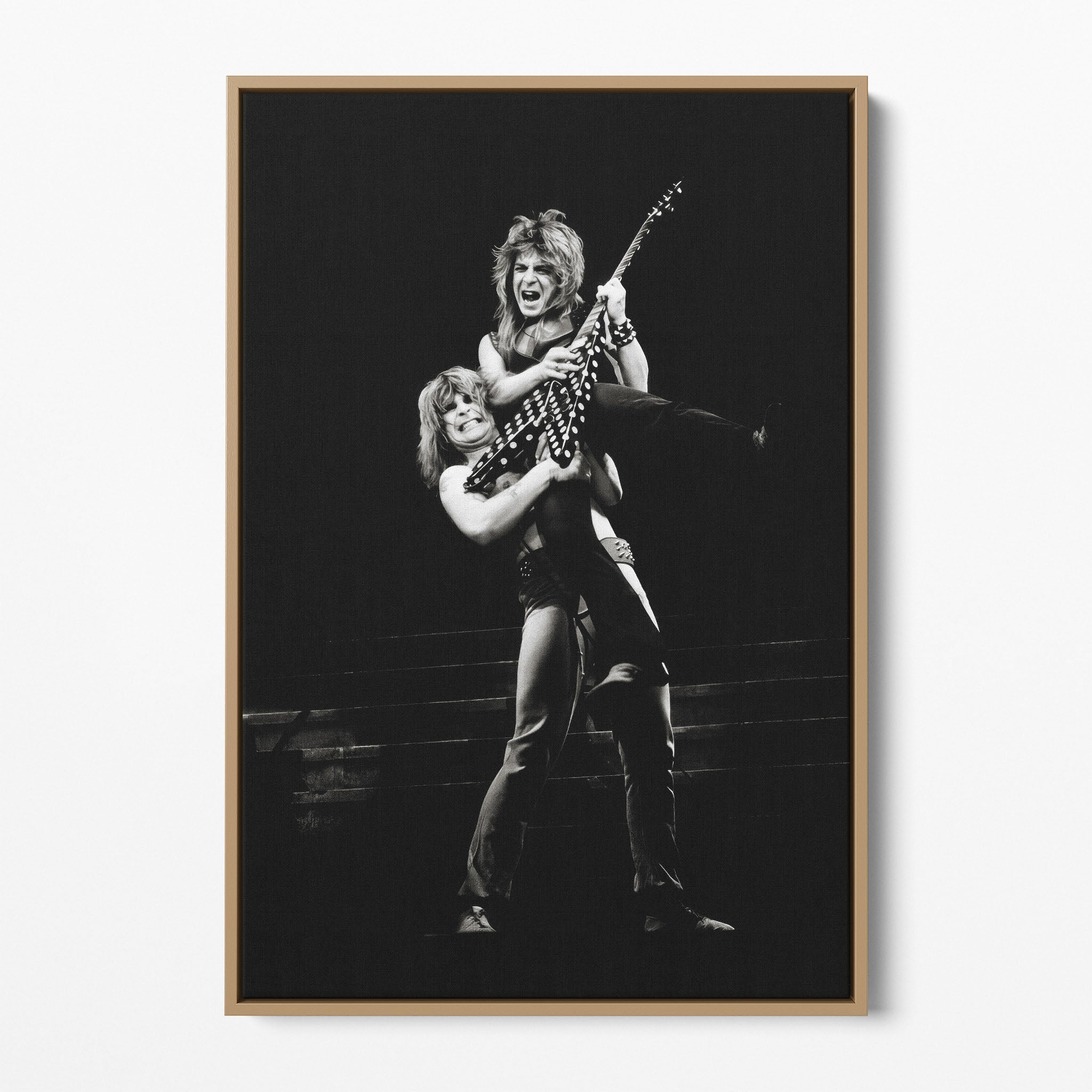 Front display of the Ozzy and Randy Rhoads black and white canvas in a natural oak floating frame