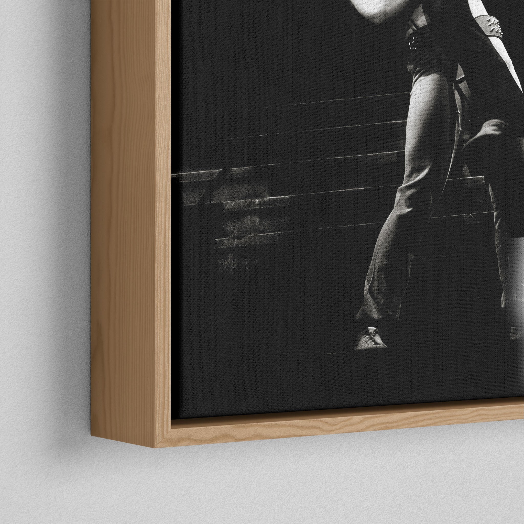 Corner close-up of the natural oak floating frame on the Ozzy and Randy Rhoads black and white canvas