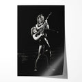 Unframed black and white print of Ozzy Osbourne lifting Randy Rhoads with his polka-dot Flying V, 1982