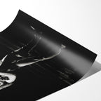 Angled close-up of the unframed Ozzy and Randy Rhoads black and white poster showing fine paper detail