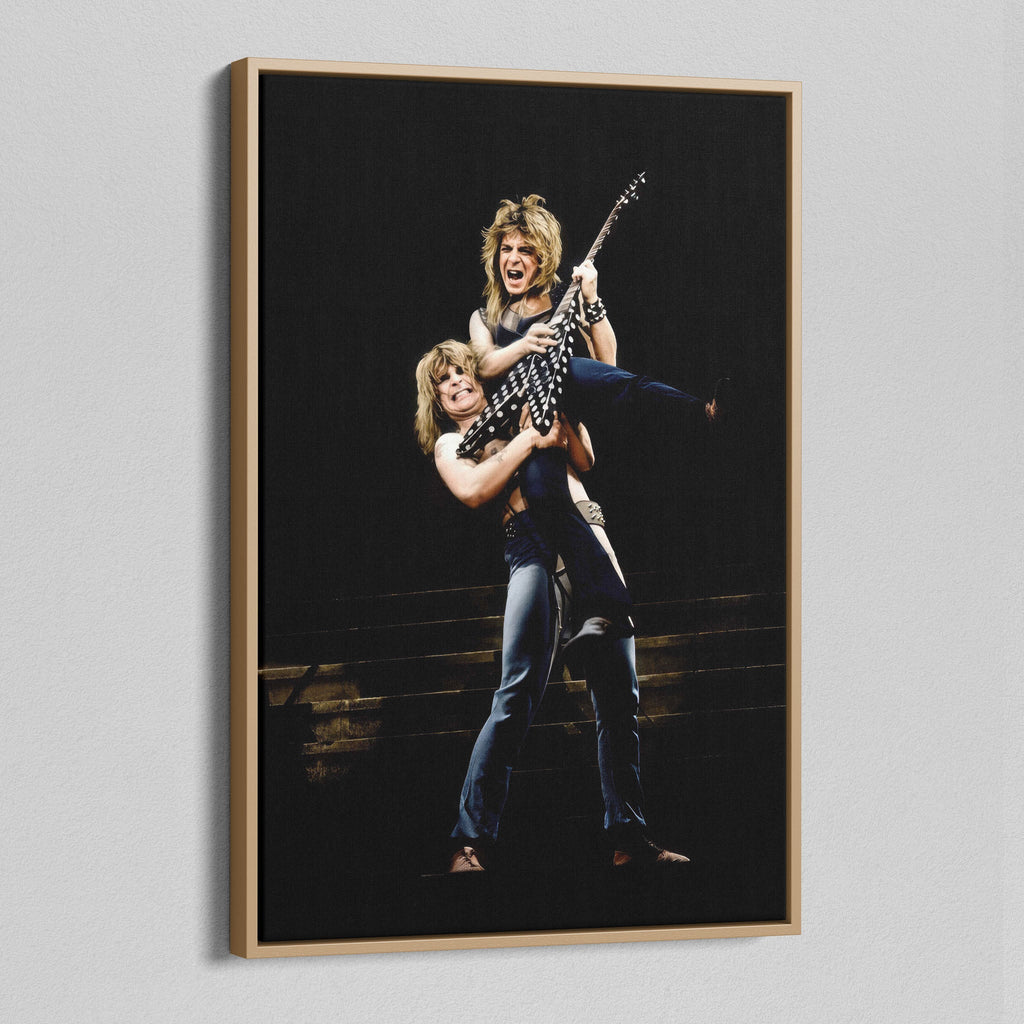 Angled view of the Ozzy and Randy Rhoads colour canvas in a natural oak floating frame