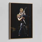 Angled view of the Ozzy and Randy Rhoads colour canvas in a natural oak floating frame