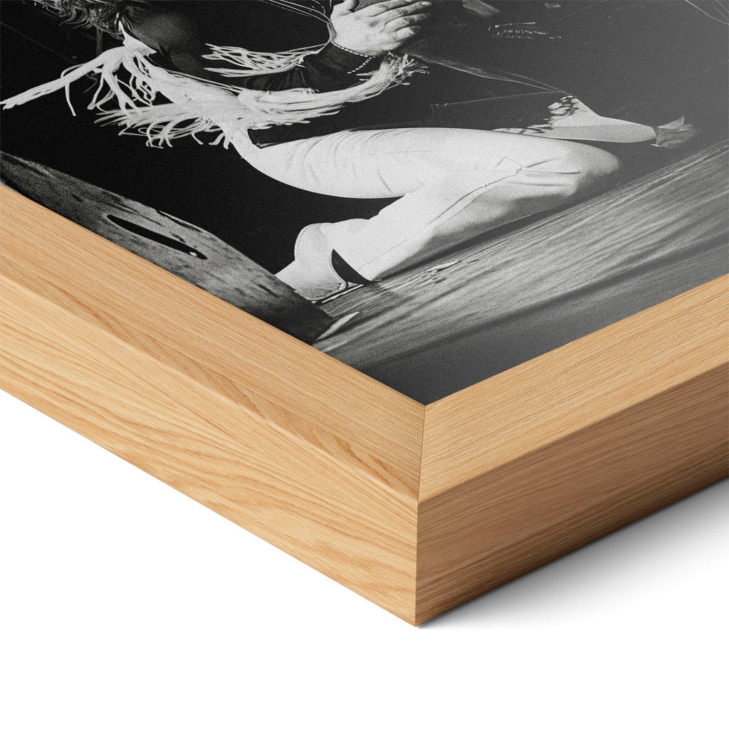 Close-up of the natural oak frame on the Ozzy and Randy Rhoads black and white poster