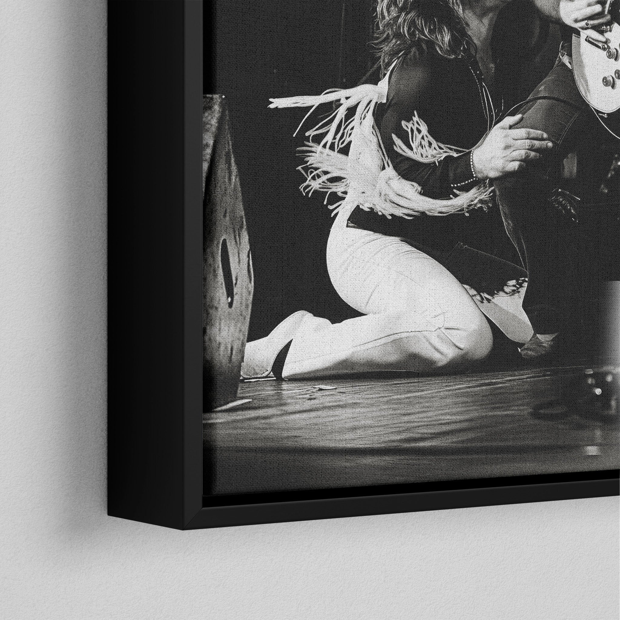 Corner close-up of the black floating frame on the Ozzy and Randy Rhoads black and white canvas