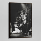 Angled view of the Ozzy and Randy Rhoads black and white canvas in a dark walnut floating frame