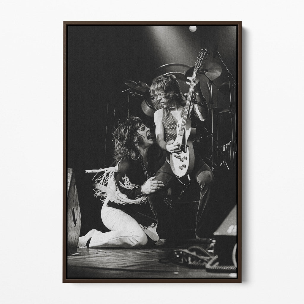 Front display of the Ozzy and Randy Rhoads black and white canvas in a dark walnut floating frame