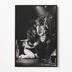 Front display of the Ozzy and Randy Rhoads black and white canvas in a dark walnut floating frame