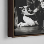 Close-up of the dark walnut floating frame on the Ozzy and Randy Rhoads black and white canvas