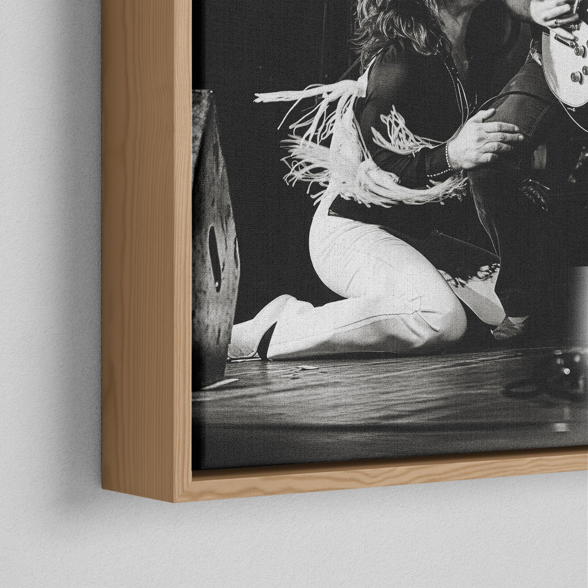 Corner close-up of the natural oak floating frame on the Ozzy and Randy Rhoads black and white canvas