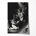 Unframed black and white print of Ozzy Osbourne kneeling before Randy Rhoads, Bradford 1980