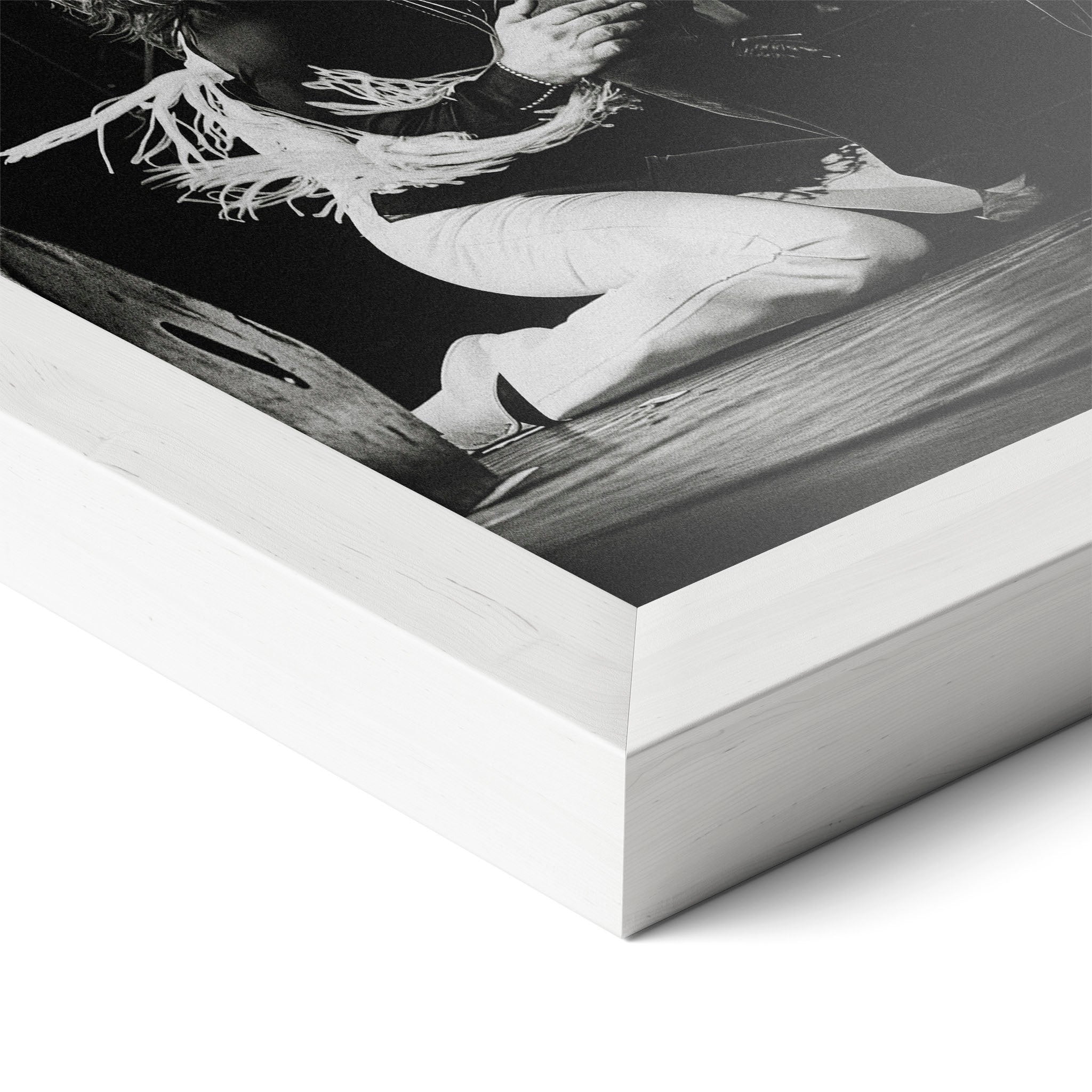 Corner close-up of the Ozzy and Randy Rhoads black and white poster in a white frame