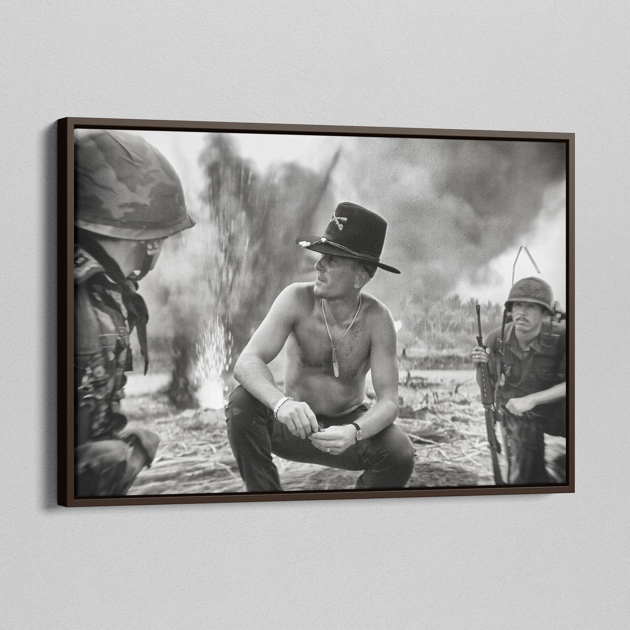 Angled view of the Apocalypse Now Kilgore black and white canvas in a dark walnut floating frame