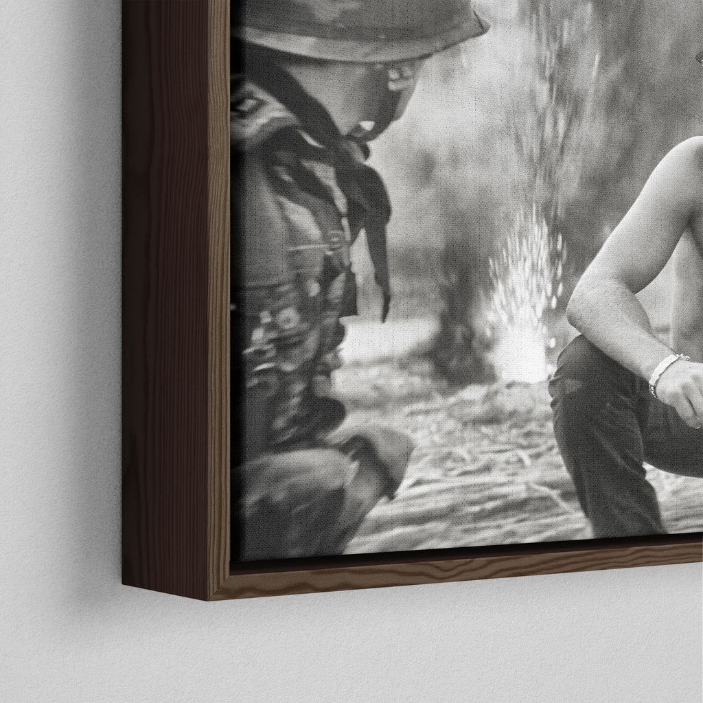 Close-up of the dark walnut floating frame on the Apocalypse Now Kilgore black and white canvas