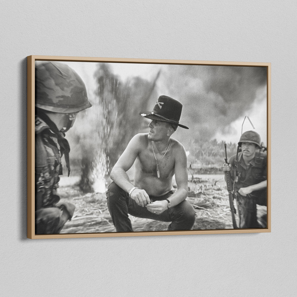 Angled view of the Apocalypse Now Kilgore black and white canvas in a natural oak floating frame