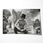 Unframed black and white print of Kilgore crouching on the beach amid napalm smoke in Apocalypse Now