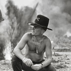 Zoomed detail of Robert Duvall as Kilgore in his Air Cavalry Stetson in black and white