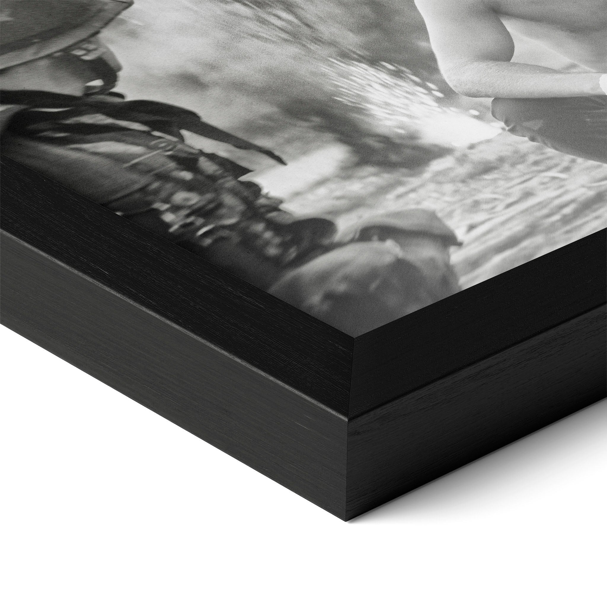 Close-up of the Apocalypse Now Kilgore black and white poster in a classic black wood frame