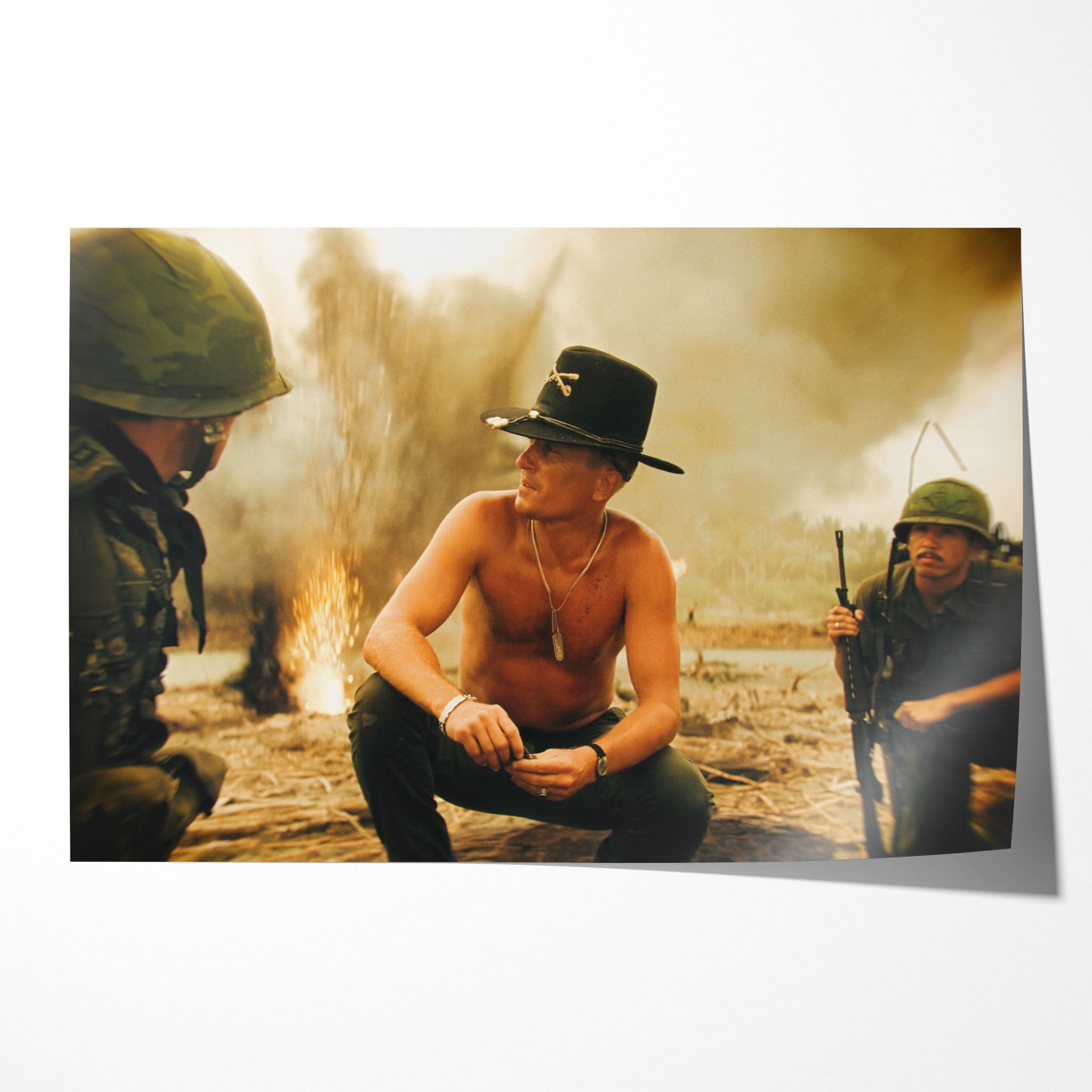 Unframed colour print of Kilgore crouching on the beach amid napalm smoke in Apocalypse Now