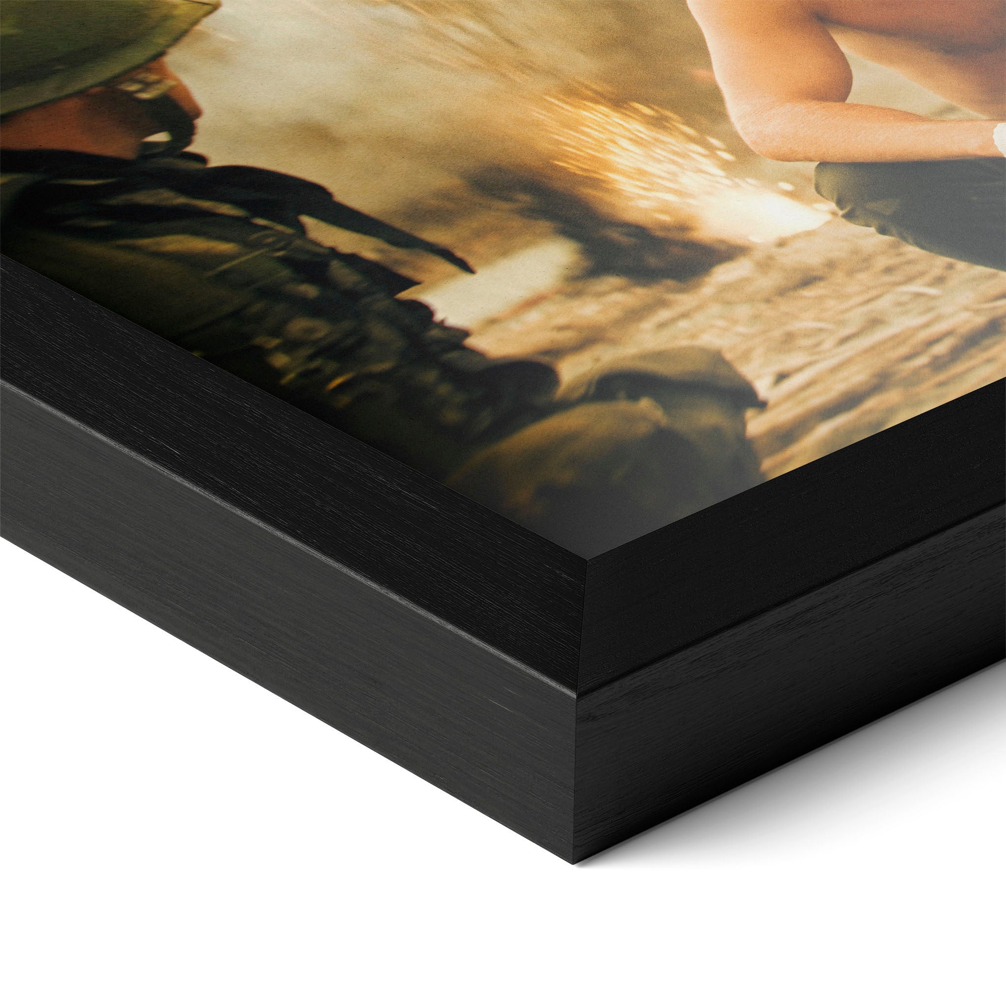 Close-up of the Apocalypse Now Kilgore colour poster in a classic black wood frame