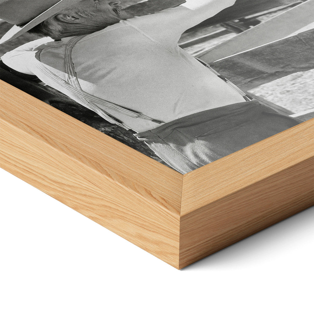 Close-up of the natural oak frame on the Lonesome Dove Hat Creek black and white poster