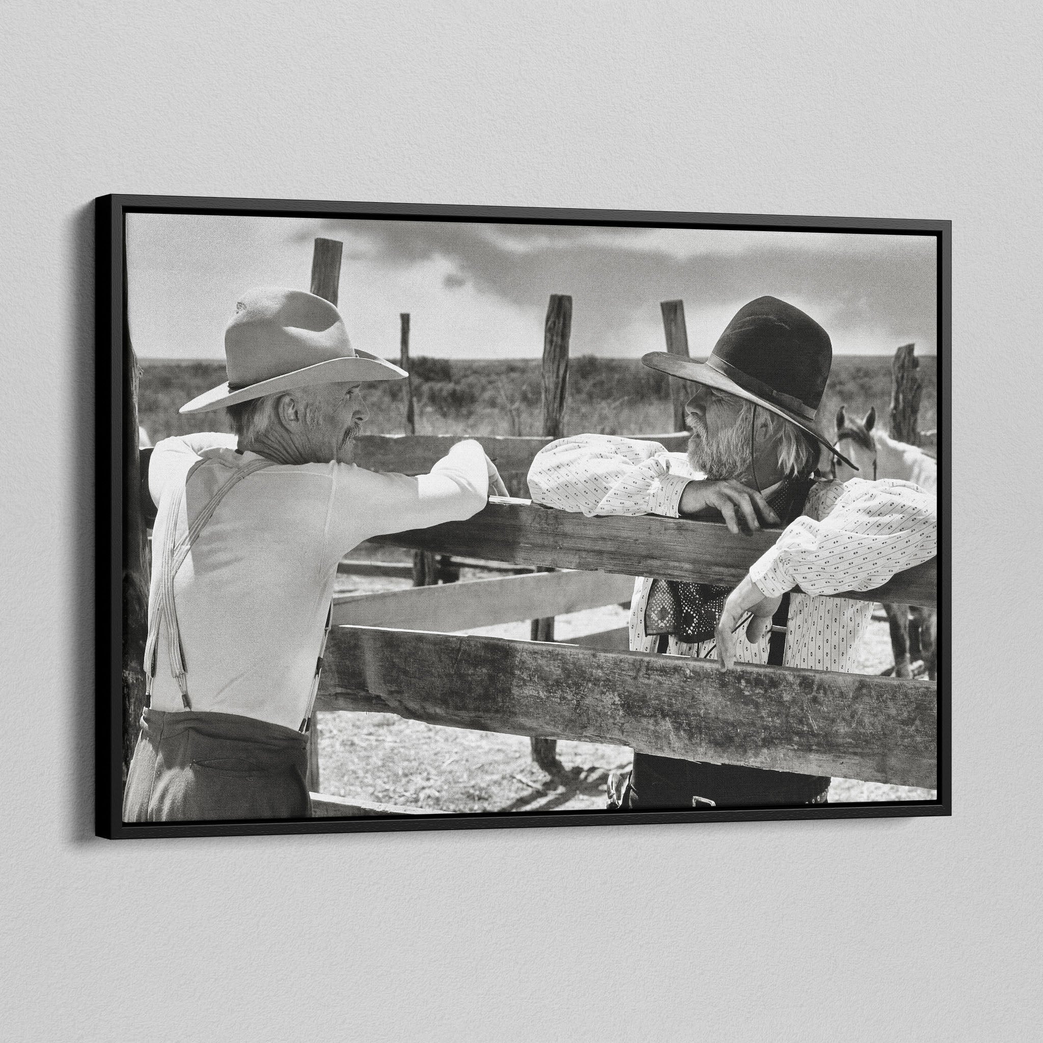 Angled view of the Lonesome Dove Hat Creek black and white canvas in a black floating frame