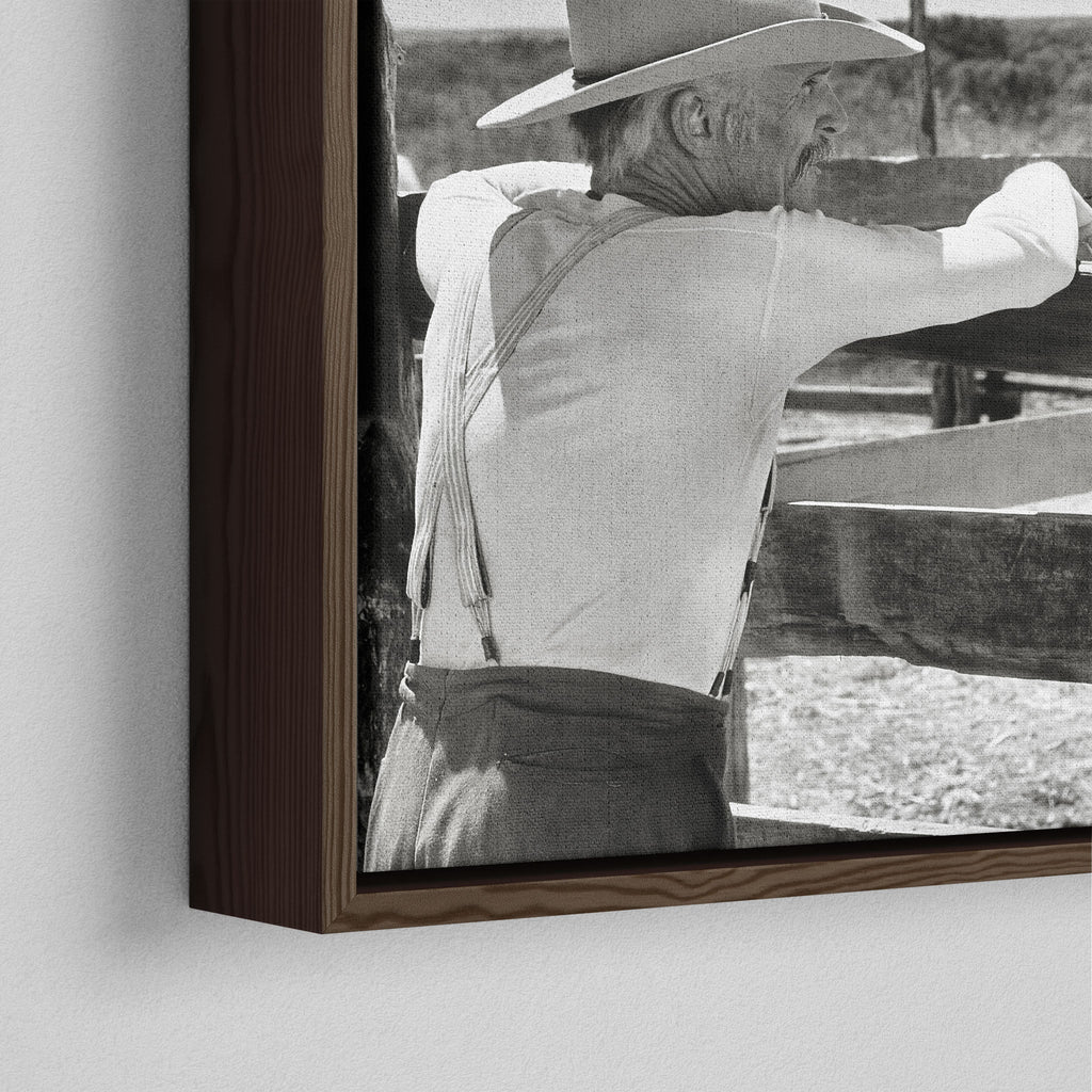 Close-up of the dark walnut floating frame on the Lonesome Dove Hat Creek black and white canvas
