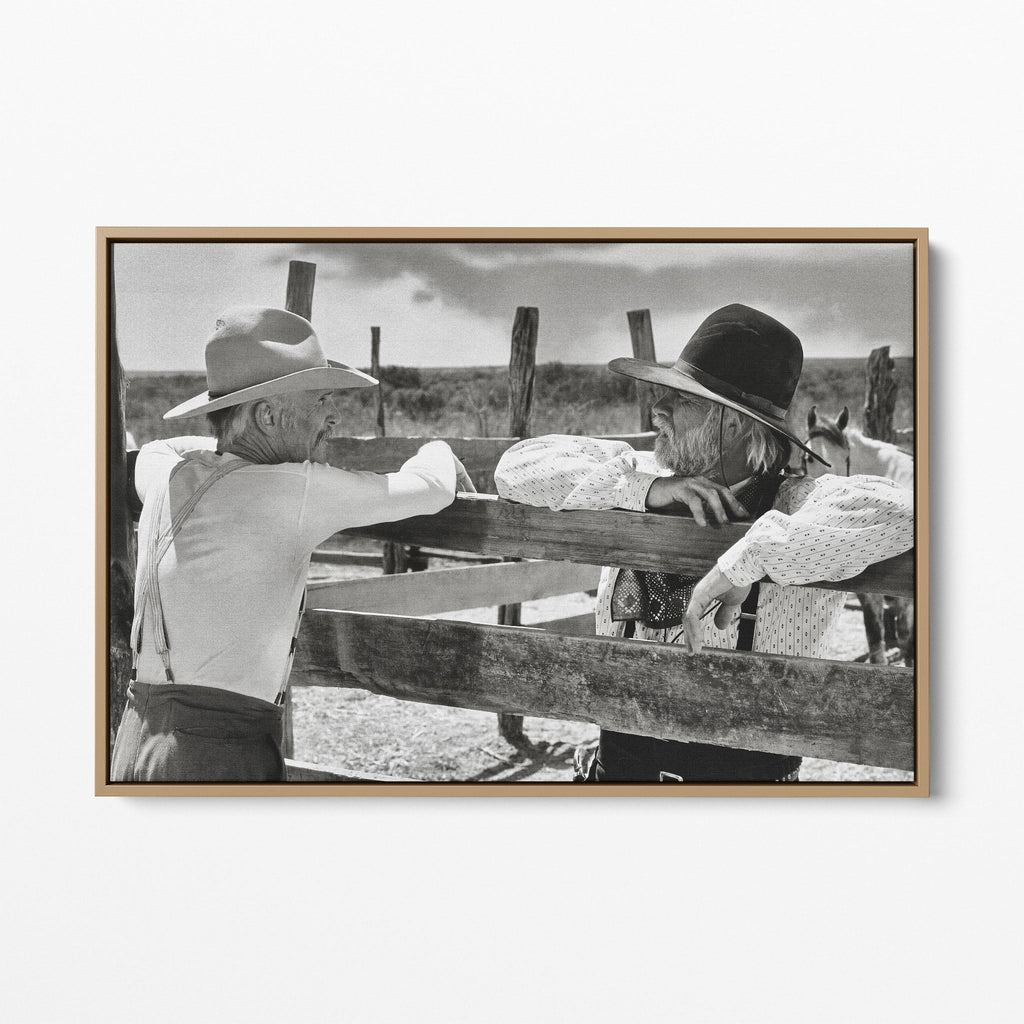 Front display of the Lonesome Dove Hat Creek black and white canvas in a natural oak floating frame