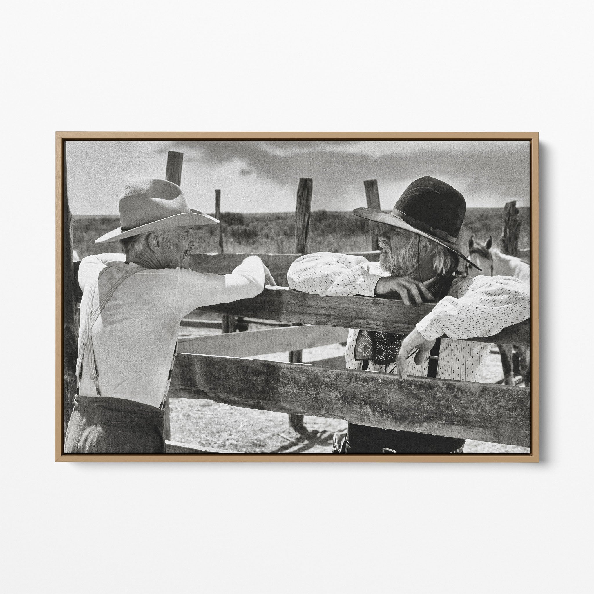 Front display of the Lonesome Dove Hat Creek black and white canvas in a natural oak floating frame