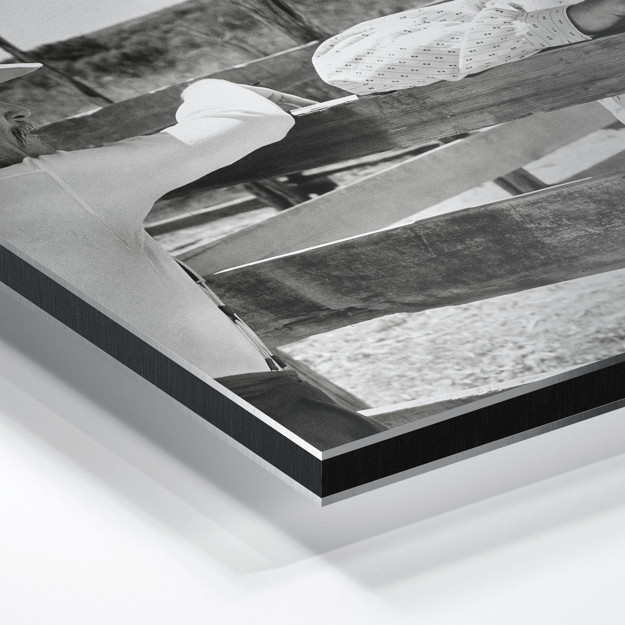 Close-up of the aluminum edge on the Lonesome Dove Hat Creek black and white metal print